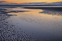 Wales, Llanfairfechan, Beach patterns at sunset.