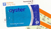 England, London, Old scuffed and well used TFL Oyster pre pay travel card. **Editorial Use Only**