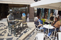 Portugal, Estremadura, Lisbon, Chiado, Statue outside Cafe A Brasileira on Rua Garrett.