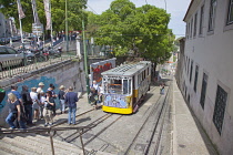 Portugal, Estremadura, Lisbon, Bairro Alto, Elevador da Gloria, Funicular railway tram covered in graffiti.