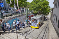 Portugal, Estremadura, Lisbon, Bairro Alto, Elevador da Gloria, Funicular railway tram covered in graffiti.