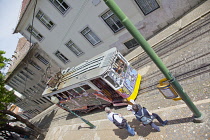 Portugal, Estremadura, Lisbon, Bairro Alto, Elevador da Gloria, Funicular railway tram covered in graffiti.
