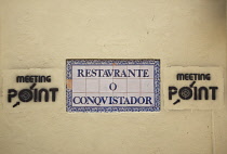 Portugal, Estredmadura, Lisbon, Bairro do Castello, Castelo de Sao Jorge, Traditional Hand Painted Azulejos Tile Mural Panel and grafitti near St Georges castle.