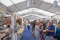 Portugal, Estredmadura, Lisbon, Baixa, Praca da Figueira, Market of local food and drink in the square.