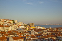Portugal, Estredmadura, Lisbon, Alfama district, rooftops seen at sunset from Chiado.