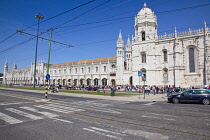 Portugal, Estredmadura, Lisbon, Belem, Mosterio Dos Jeronimos, Exterior of the monastery with tram lines.