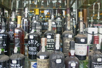 Portugal, Estremadura, Lisbon, Baixa district, Window display of Port wines.