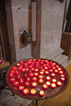 Portugal, Estredmadura, Lisbon, Alfama district, Votive candles in Church of Sao Vicente of Fora.