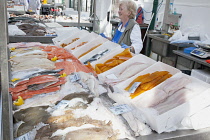 Ireland, North, Belfast, St George's Market interior, Display of fresh fish on ice.
