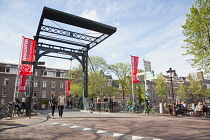 Holland, North, Amsterdam, Typical Dutch lifting bridge over canal.