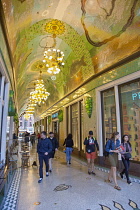 Holland, North, Amsterdam, Ornate shopping arcade on Damrak.