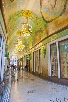 Holland, North, Amsterdam, Ornate shopping arcade on Damrak.