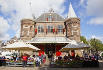 Holland, North, Amsterdam, Old city gate De Waag in the Nieuwmarkt neighbourhood, now a cafe.