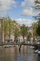 Holland, North, Amsterdam, Footbridge over canal.