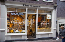 Holland, North, Amsterdam, Exterior of cheese bar with window display of various cheeses.