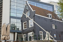 Holland, North, Amsterdam, Contrasting old and new Dutch buildings