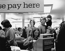 England, Merseyside, Southport, Lost child in Marks and Spencer store, 1975.