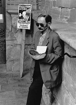 France, Brittany, Guerande, Beggar outside the Cathedral, 1987.