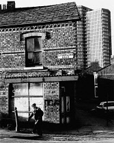 England, Merseyside, Bootle, Old man 'Going for a Pint', 1975.