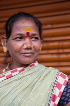 India, Pondicherry, Portait of a young woman with nasal piercings.