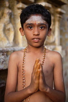 India, Tamil Nadu, Kumbakonam, Portrait of a pilgrim at the Nagesvara Swami temple in Kumbakonam.
