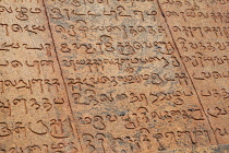 India, Tamil Nadu, Tanjore, Thanjavur, Detail of the script engraved into the walls of the Brihadisvara Temple in Tanjore.
