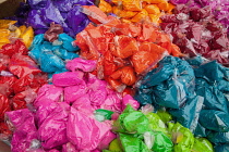 India, Tamil Nadu, Tanjore, Thanjavur, Bags of paint powder to be used to celebrate the Holi festival .