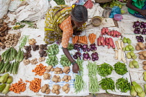 India, Tamil Nadu, Tanjore, Thanjavur, Vegetable seller in the market at Tanjore.