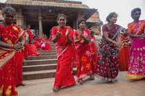 India, Tamil Nadu, Tanjore, Thanjavur, Pilgrims at the Brihadisvara Temple in Tanjore perform a ritual dance.