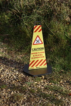 England, Kent, Warning cone, caution sign for drone in use.