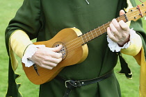 England, Kent, Replica Elizabethan Guitar being played by a historical re-enactment group.