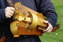 England, Kent, Replica Hurdy-gurdy being played by historical re-enactment group.