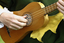 England, Kent, Replica Elizabethan Guitar being played by a historical re-enactment group.