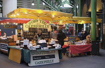 England, London, Borough Market, Cheese stall.