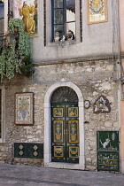 Italy, Sicily, Taormina, Exterior of ornately decorated house.