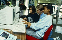 Education, Computers, teens working at PC.