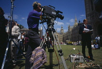 England, London, Media, TV Crew, BBC News live broadcast outside the Houses of Parliament during re-election of John Major and the Conservatives in 1995.