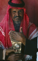 Qatar, General, Portrait of a Bedouin man in a tent.