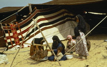 Qatar, General, Bedouin women and children outside tent.