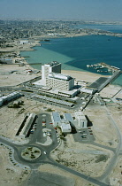 Qatar, Doha, The harbour area under development in the 1970 s with the Gulf Hotel in the foreground.