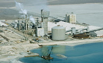 Qatar, Umm Said, Industrial complex on the coast at the edge of the desert.