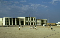 Qatar, Doha, Children playing soccer.