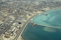 Qatar, Doha, Aerial view of city and waterfront.