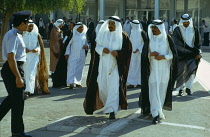 Qatar, Doha, Government officials in traditional dress.