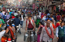 India, Uttar Pradesh, Varanasi, Pedestrians and road users on Dasashwamedh Ghat Road.