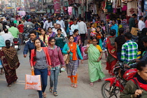 India, Uttar Pradesh, Varanasi, Pedestrians and road users on Dasashwamedh Ghat Road.