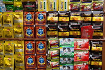 India, Uttar Pradesh, Lucknow, Display of sachets of pan masala at a vending kiosk.