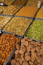 India, Uttar Pradesh, Lucknow, Display of namkeen and savoury snacks.