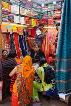 India, New Delhi, Sari shop in the old city of Delhi.