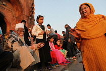 India, New Delhi, Muslim pilgrims at the entrance to the Jama Masjid in the old city of Delhi.